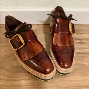 Prada Brown Leather Loafers with Gold Accent